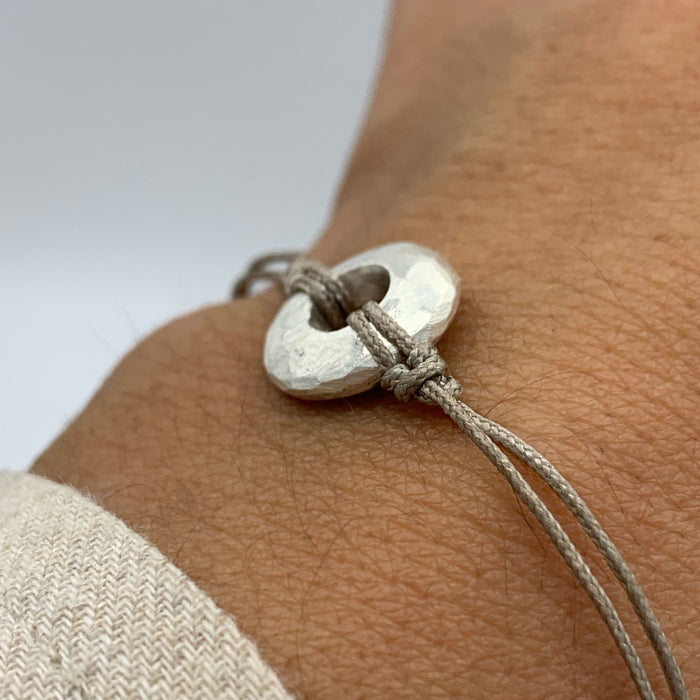 PULSERA DISC PLATA